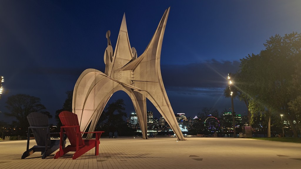 Trois Disques and view of Downtown Montreal, St Helen's Island