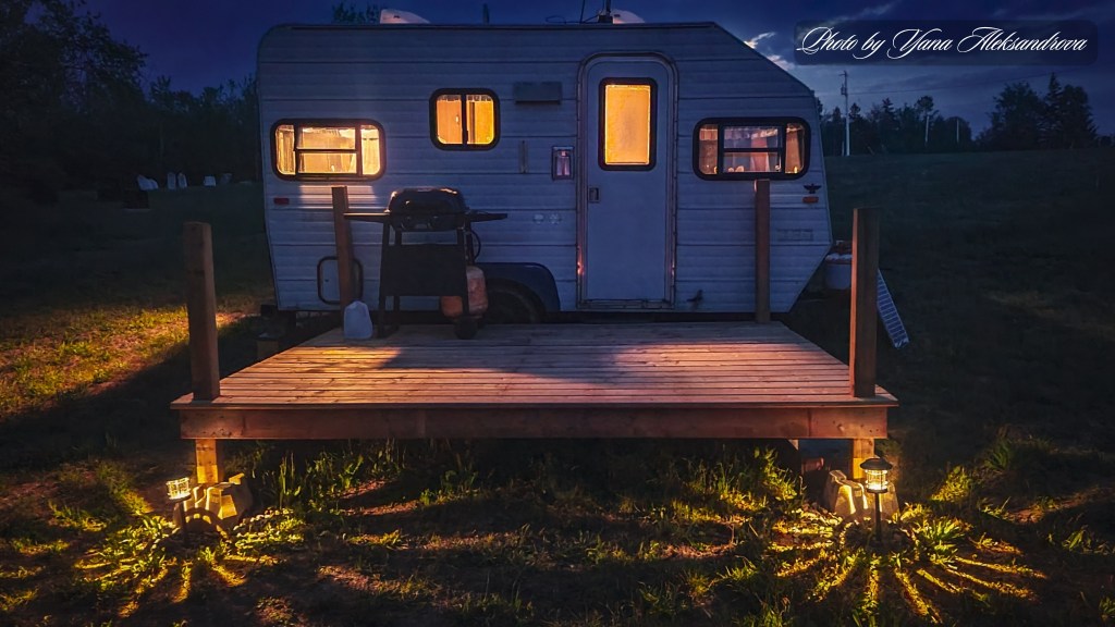 Perfect getaway Nova Scotia, Canada. Cozy camper at night